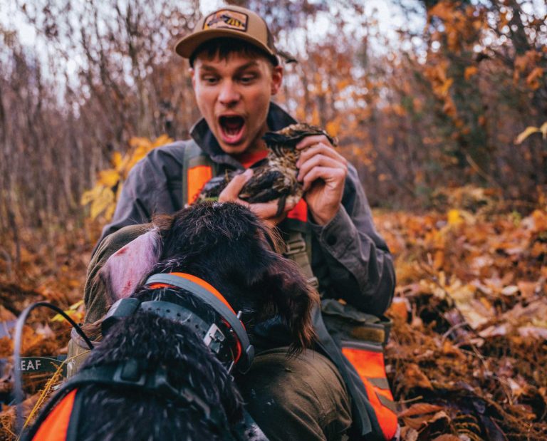 A new upland hunter with a bird dog and grouse.