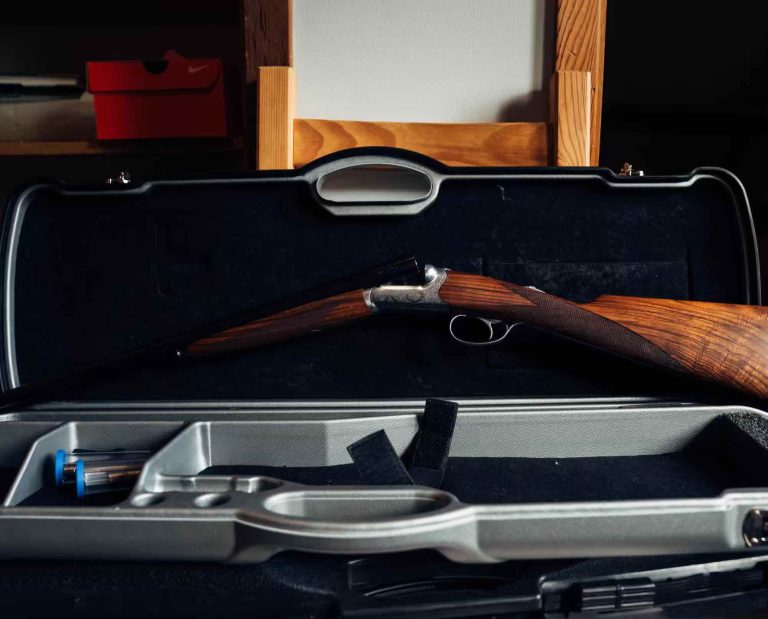 Beretta 486 Parallelo round-action shotgun in a case