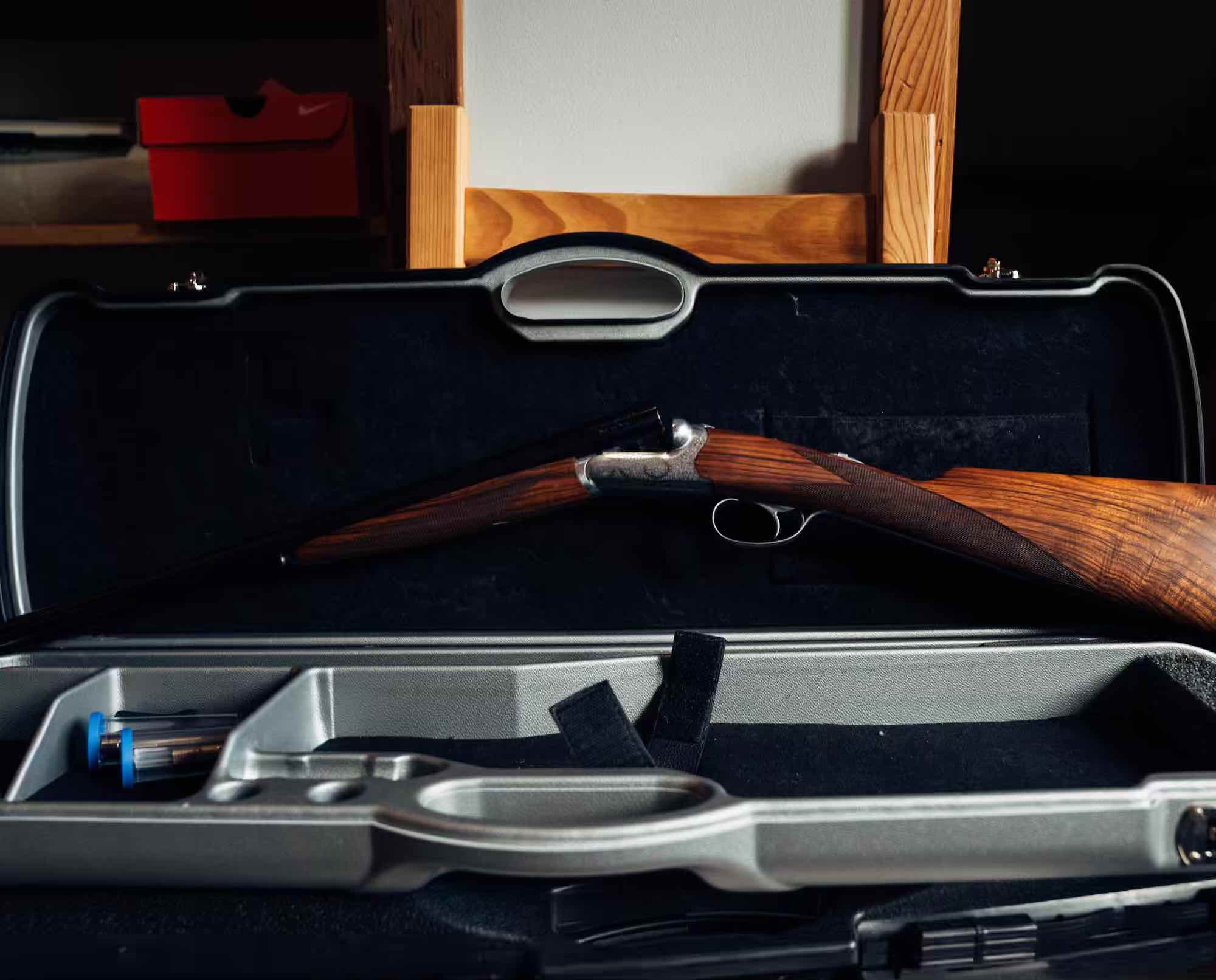 Beretta 486 Parallelo round-action shotgun in a case