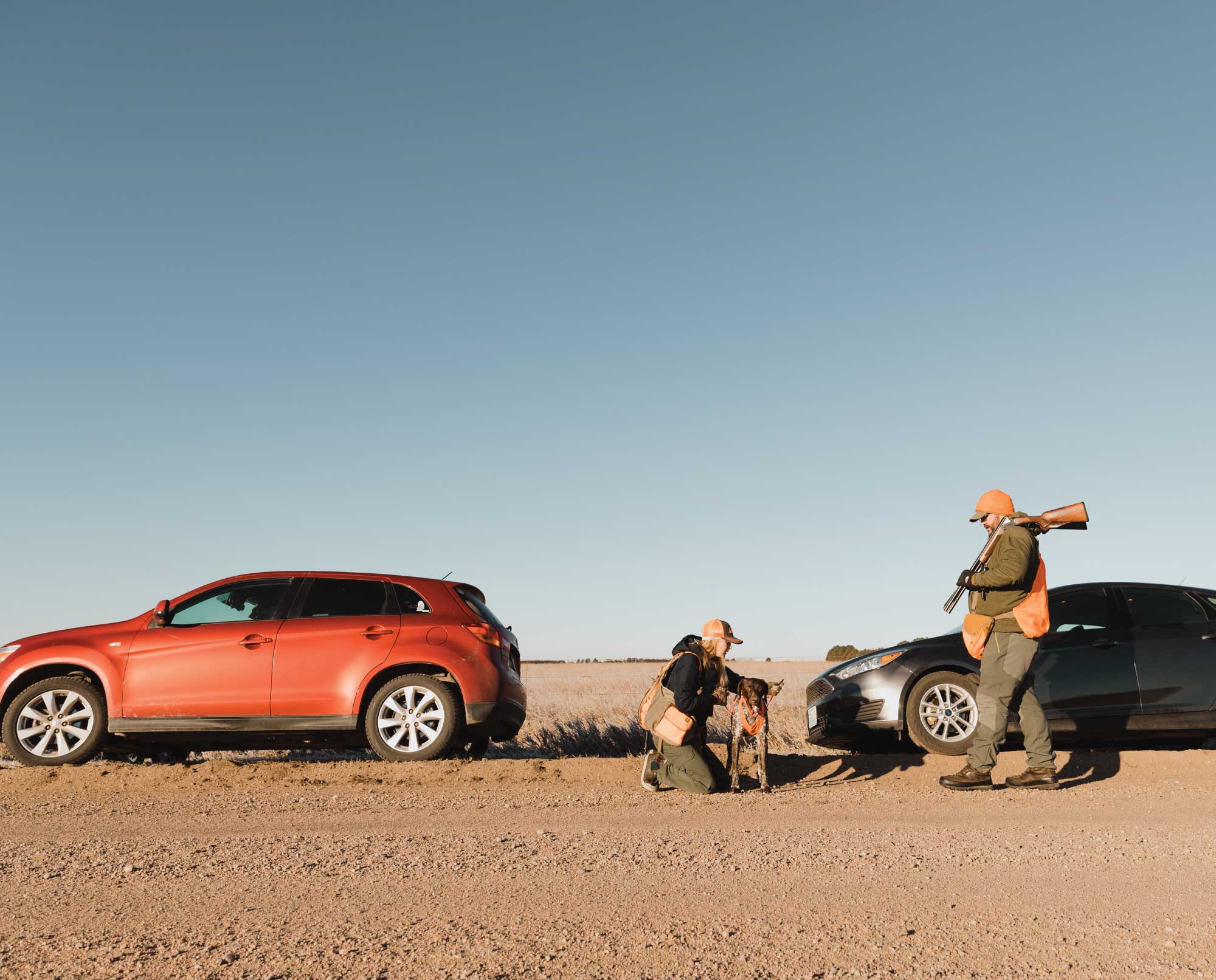Bird hunters gearing up outside their cars