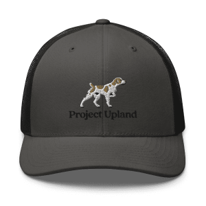 A Brittany dog embroidered on a trucker hat