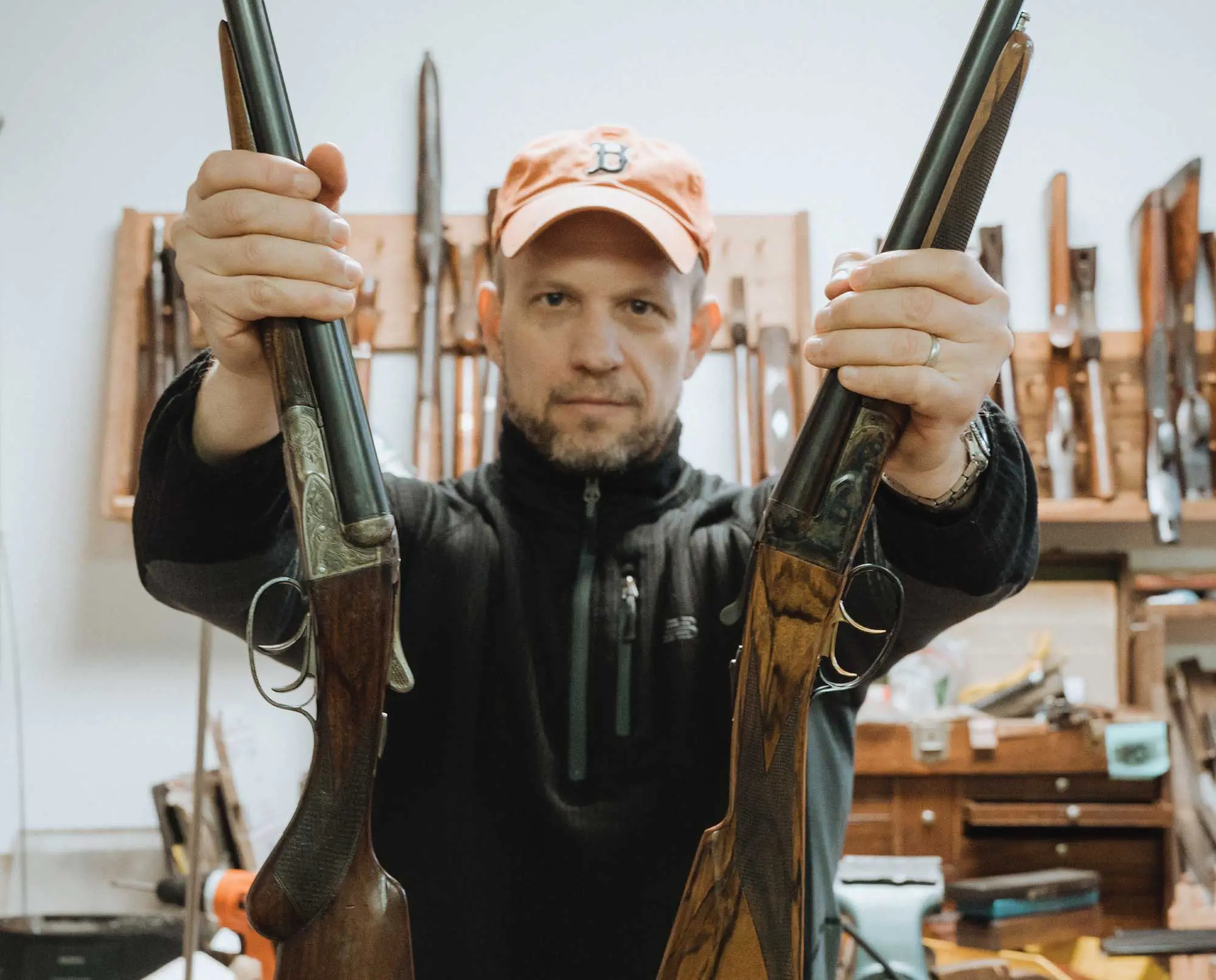 Gun writer Gregg Elliot holds an Original Fox A Grade and a new Savage Fox A Grade