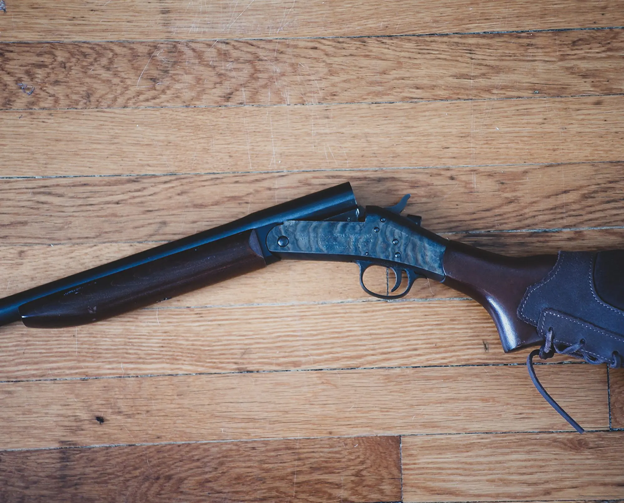 An H&R Topper 58 rests on the floor.