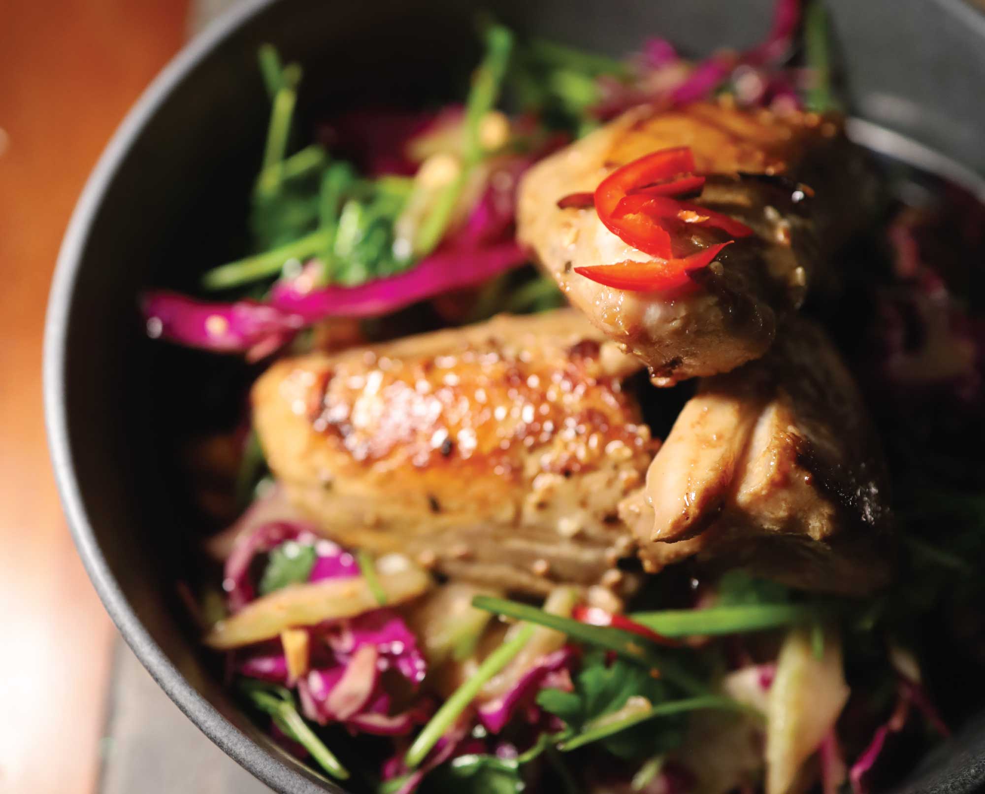 A close up of butter chukar on a plate.