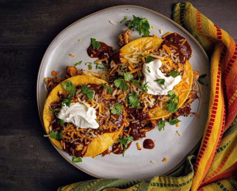 Tostadas rest on a table.