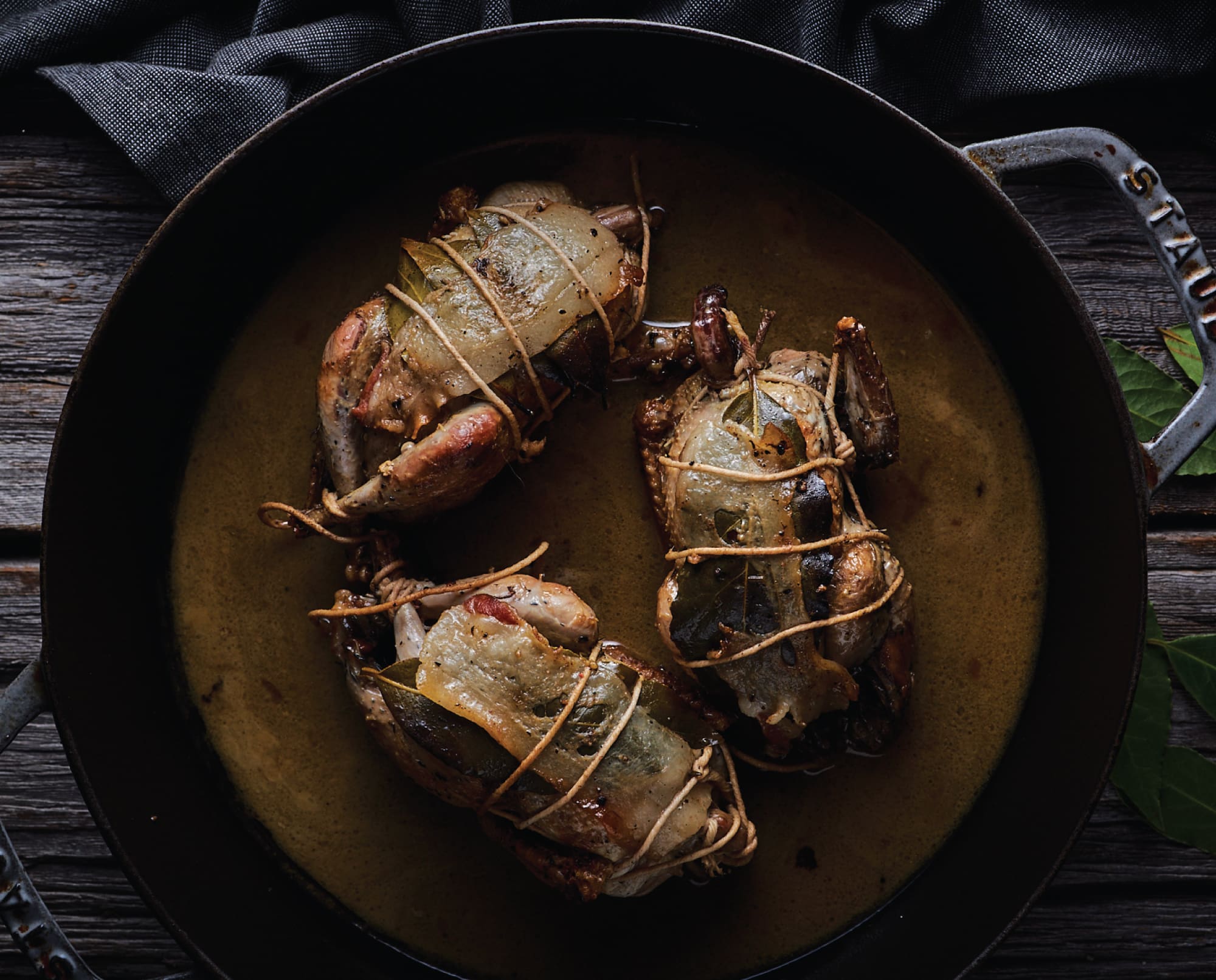 Hungarian Partridge roasted in a pan and ready to serve