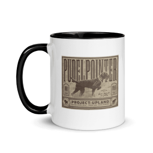 An 11 oz coffee mug with a pudelpointer dog on it.