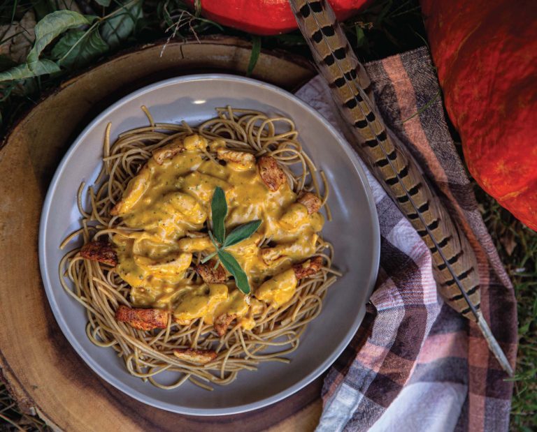 Pumpkin pheasant sage pasta on a fall themed plate