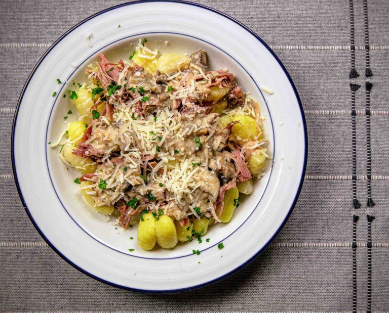 Rabbit gnocchi with mushroom cream sauce