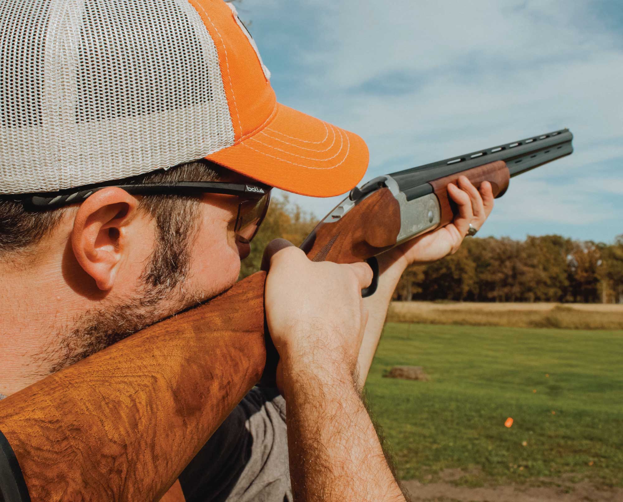 A hunter brakes clays with a Stevens 555E