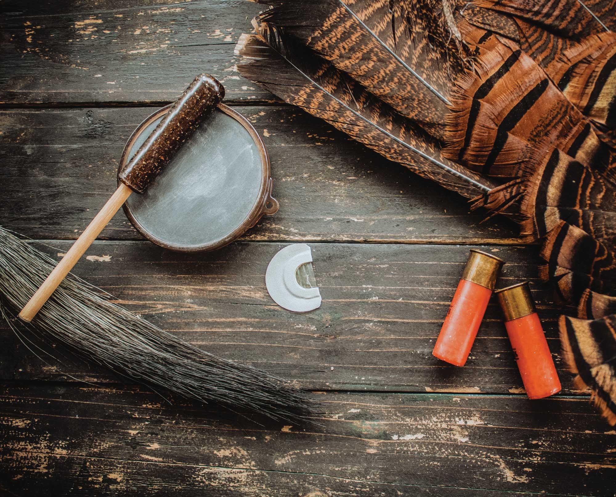 A stack of turkey calls on a table