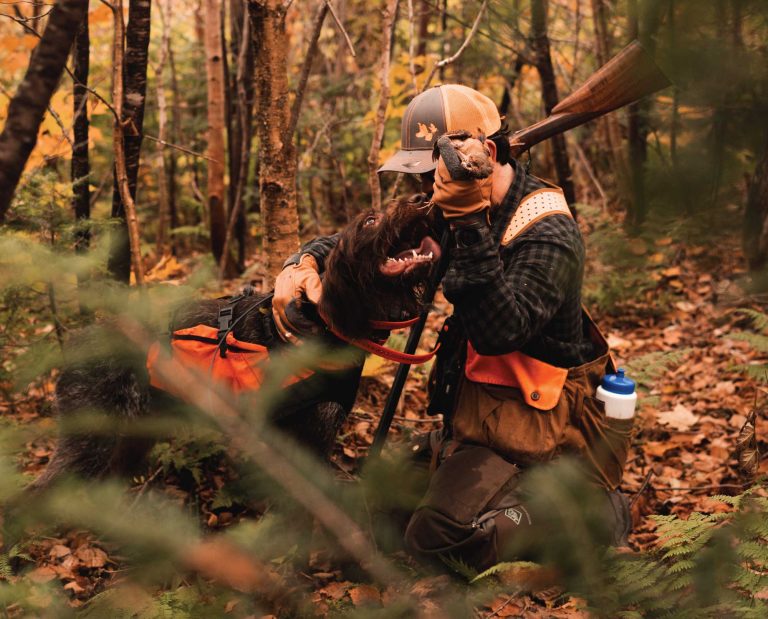 Creative Director of Project Upland with his bird dog.