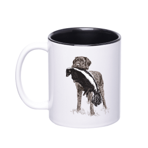 A wirehaired dog retrieving a skunk on a coffee mug