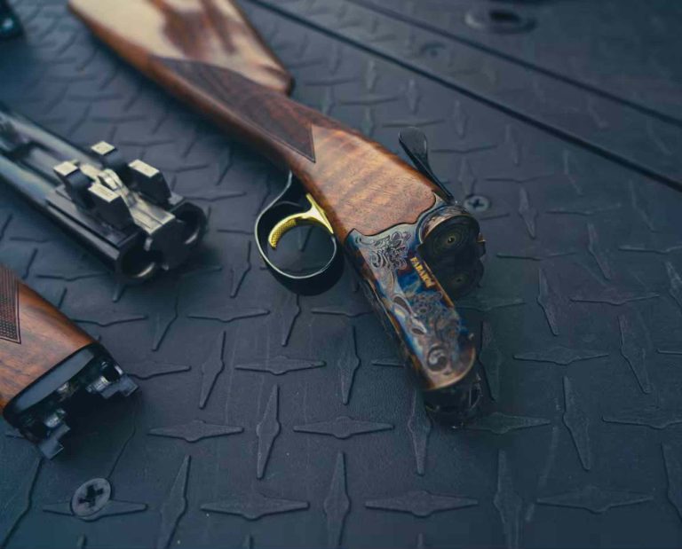 A Fabarm Autumn side by side shotgun separated into pieces