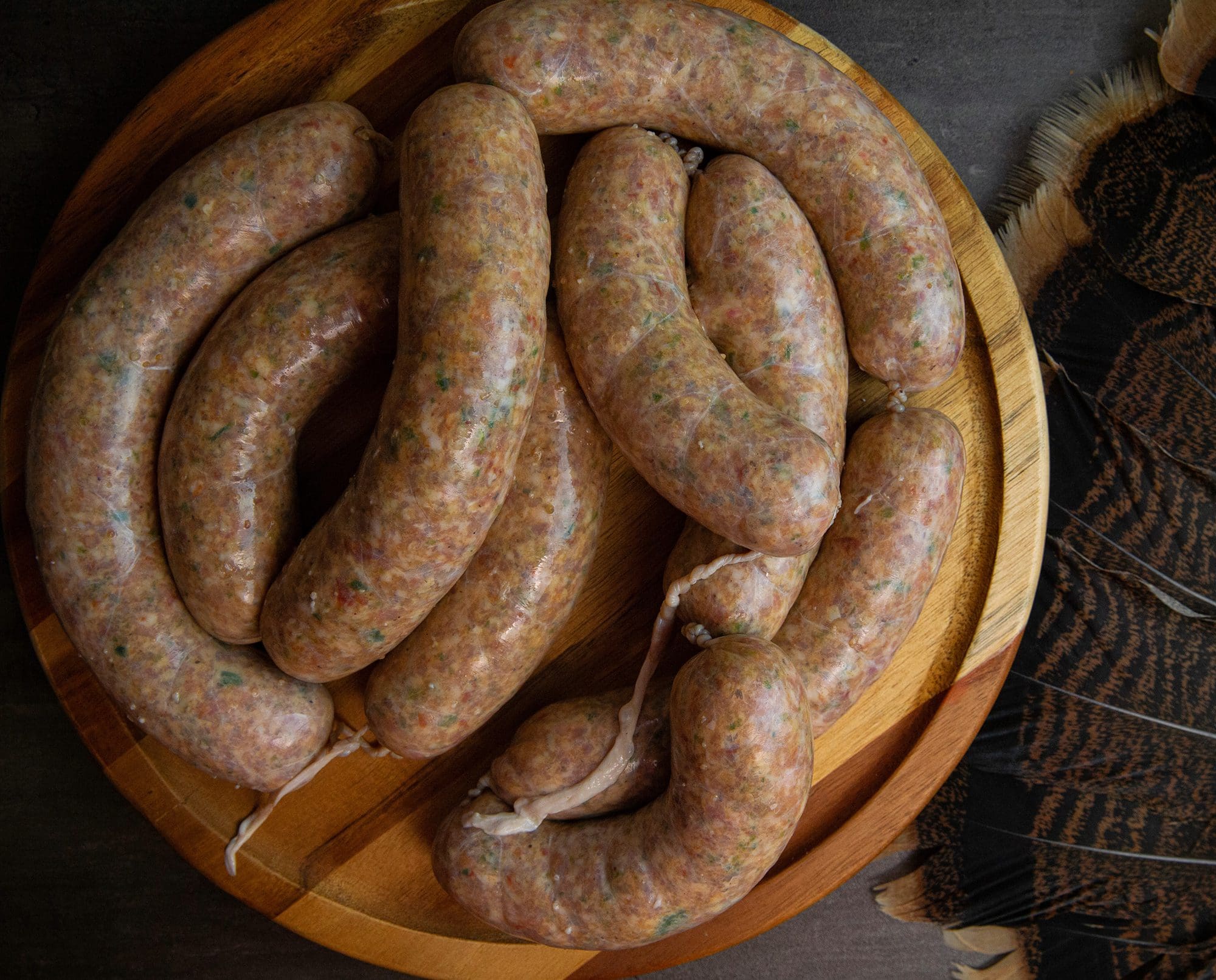 Sausage rests on a plate.
