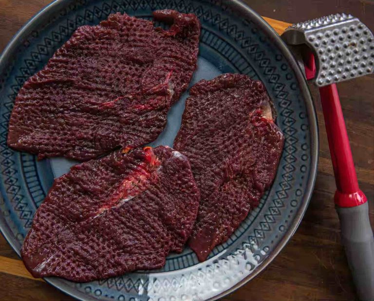 Prairie chicken breast meat tenderized by a meat tenderizer mallet