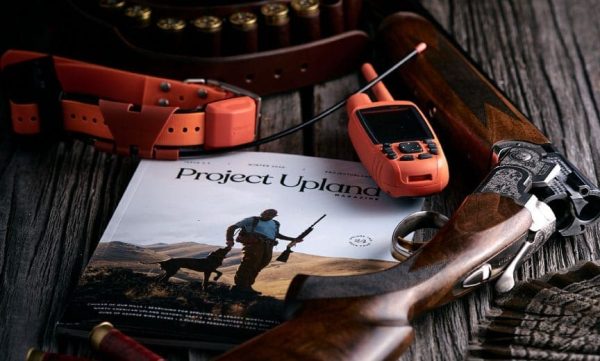 winter-2020-issue-of-projetc-upland-magazine-facebook-cover Winter 2020 issue of Project Upland Magazine on a table with bird hunting gear