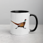 A ringneck pheasant mug on a coffee table.